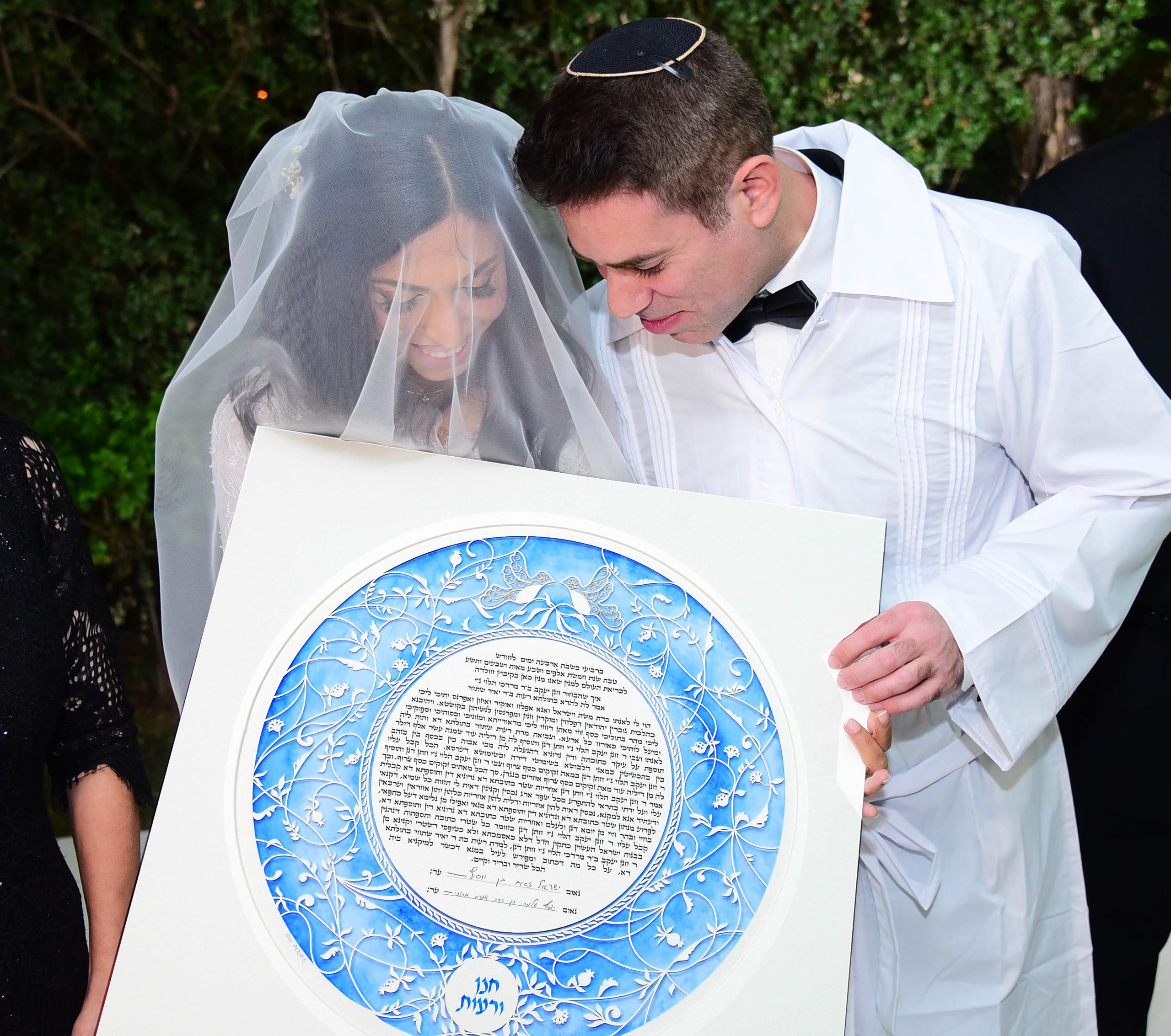 A beautiful, intricate Ketubah displayed at a wedding ceremony