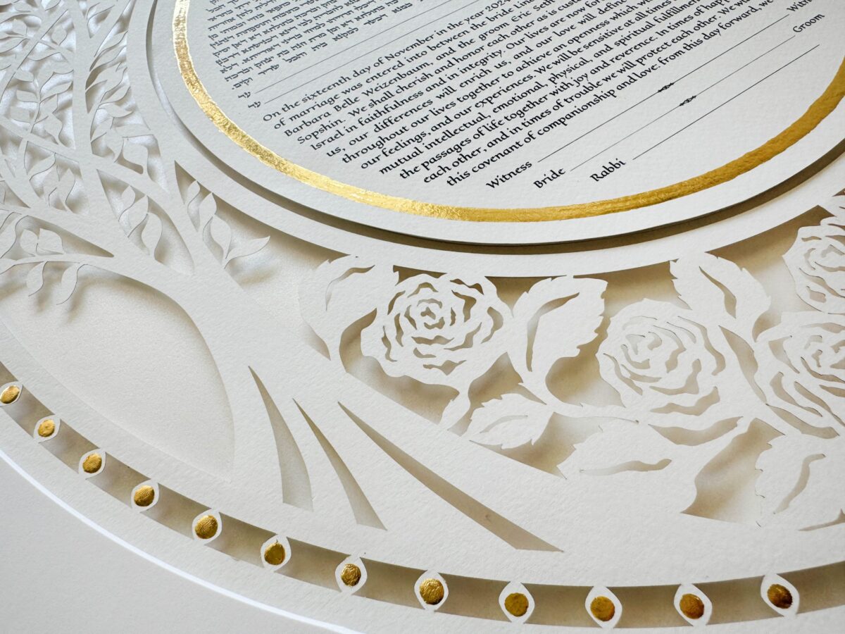 Golden Eden Ketubah papercut with tree design and hand-painted gold details