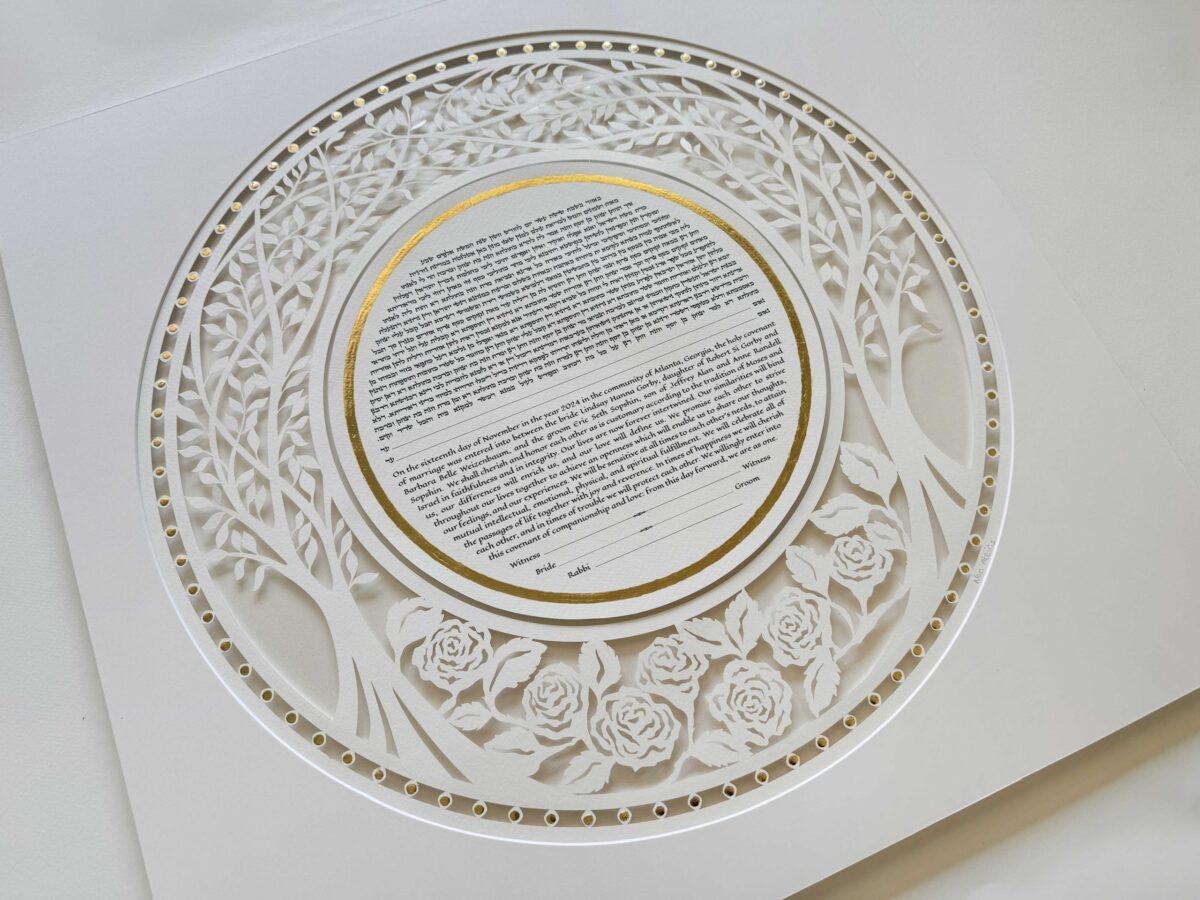 Golden Eden Ketubah papercut with tree design and hand-painted gold details