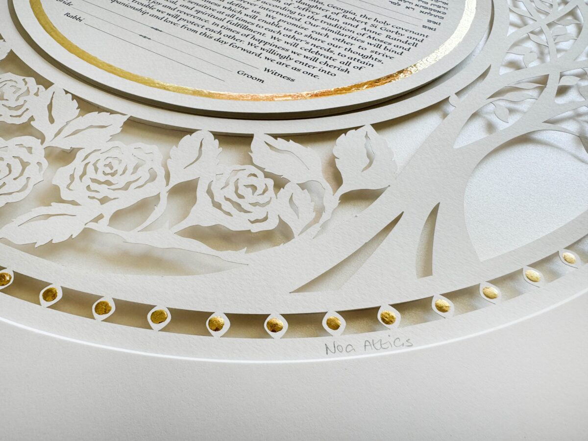 Golden Eden Ketubah papercut with tree design and hand-painted gold details