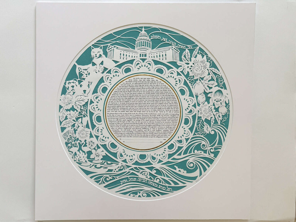 Love Journey Ketubah circular papercut design with botanical motifs, animals, and architectural elements