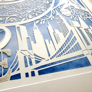 New York skyline ketubah papercut with Massachusetts elements, gold leaf LOVE sculpture and personalized details by Noa Attias