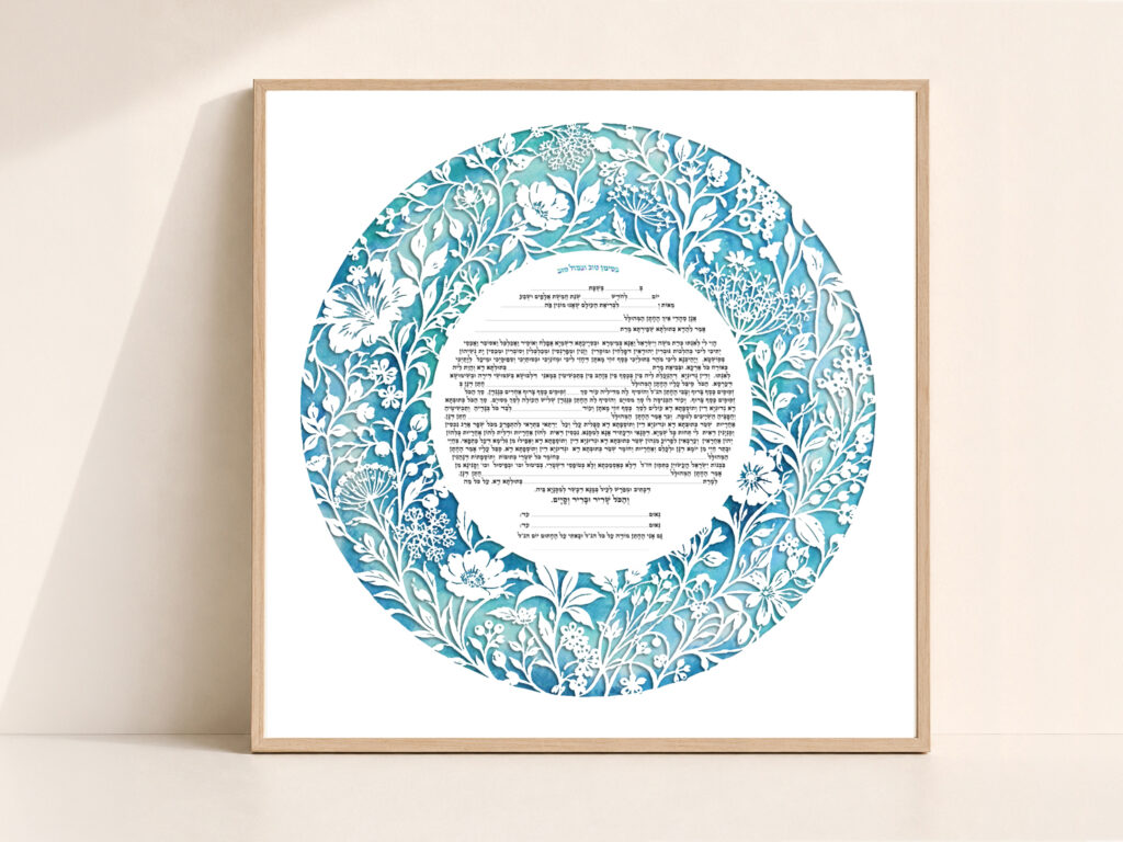 Circular Wildflower Ketubah displayed on an easel in a floral garden setting